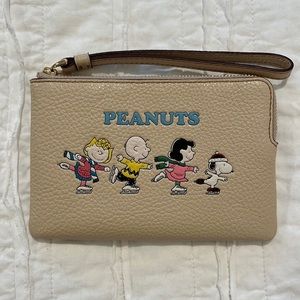 Coach x PEANUTS wristlet
